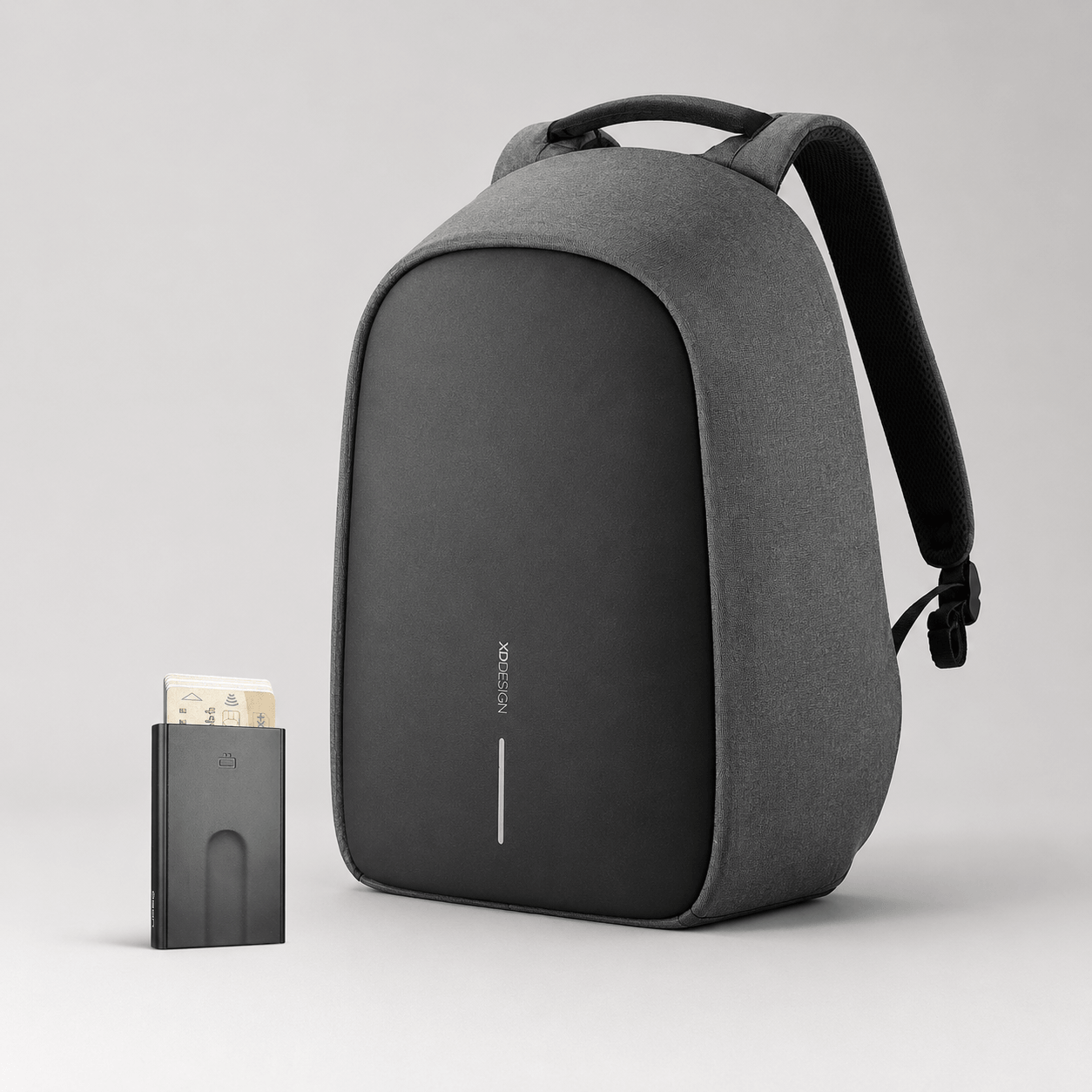 Anti-Theft Backpack and Aluminum Wallet Set featuring grey backpack and aluminum wallet